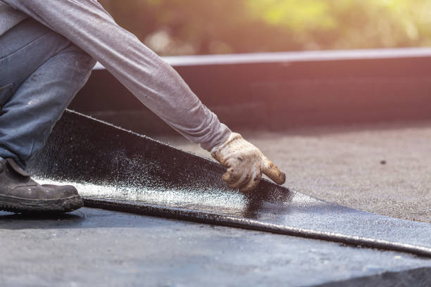 Professional Basement Waterproofing technician working in Victoria, MN